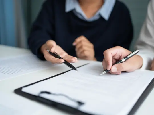 Lawyer businessman workingÂ with lawbook in officeÂ or courtroom Legal counsel with gavel and legal law. justice and lawyer concept Judge gavel hammer on Lawyer desk.